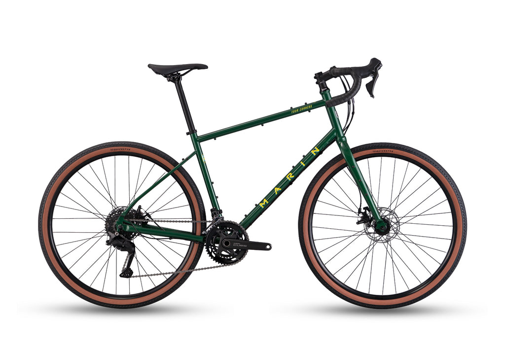 Marin Bikes Four Corners 1 gravel road bike with CUES drivetrain, green frame, suitable for adventure and touring rides.