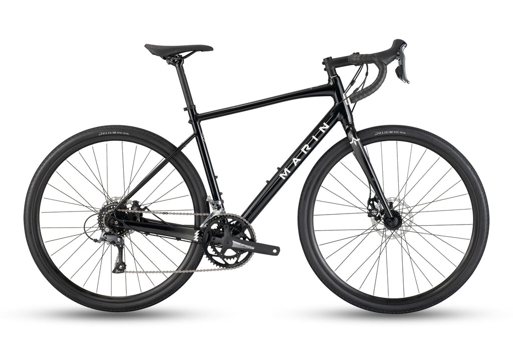Marin Bikes Gestalt Base 2026 alloy road bike for endurance, gravel, and adventure, shown in black with sleek frame and tires.