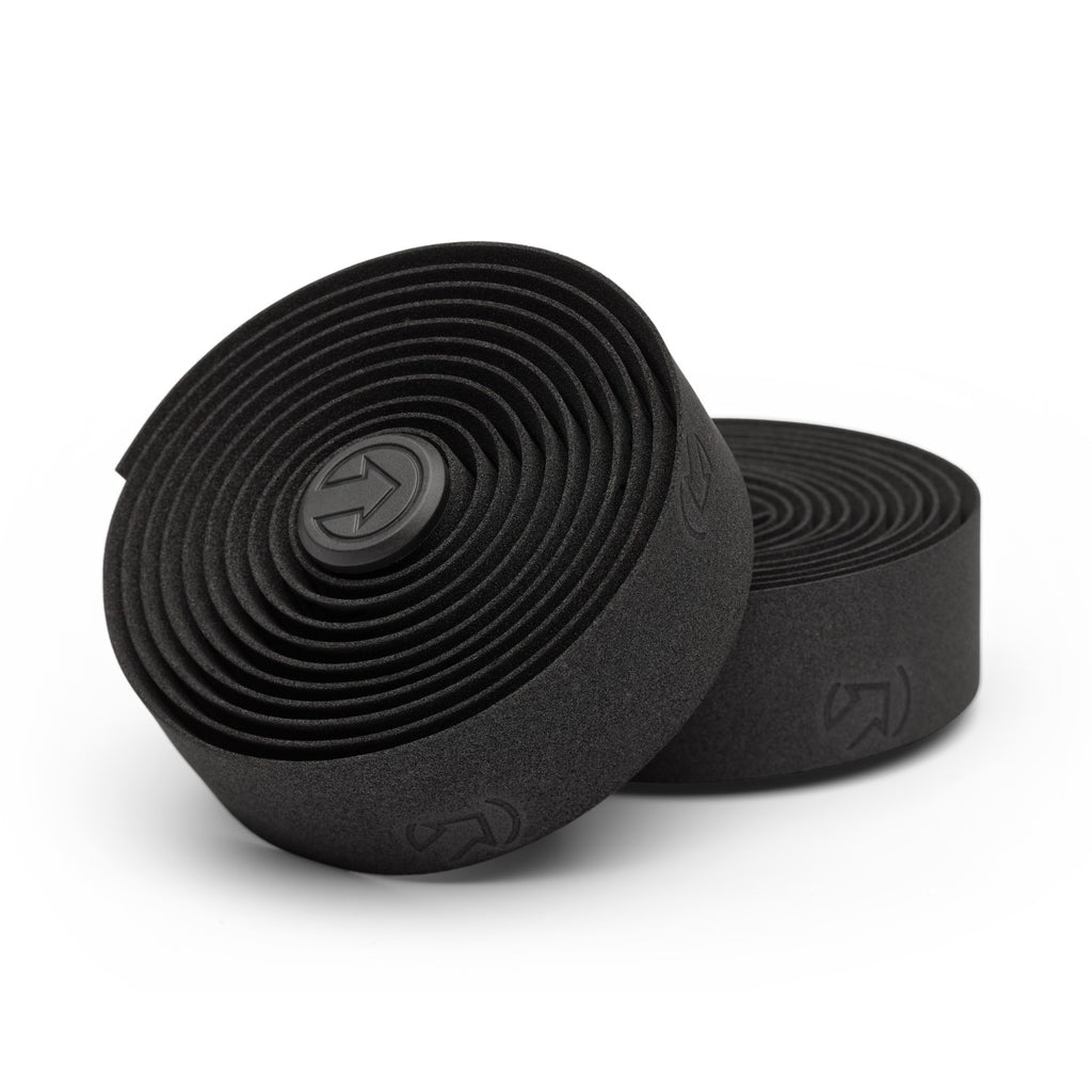 Black Shimano PRO Peaked Sport handlebar tape with textured grip for comfortable cycling handlebar coverage.