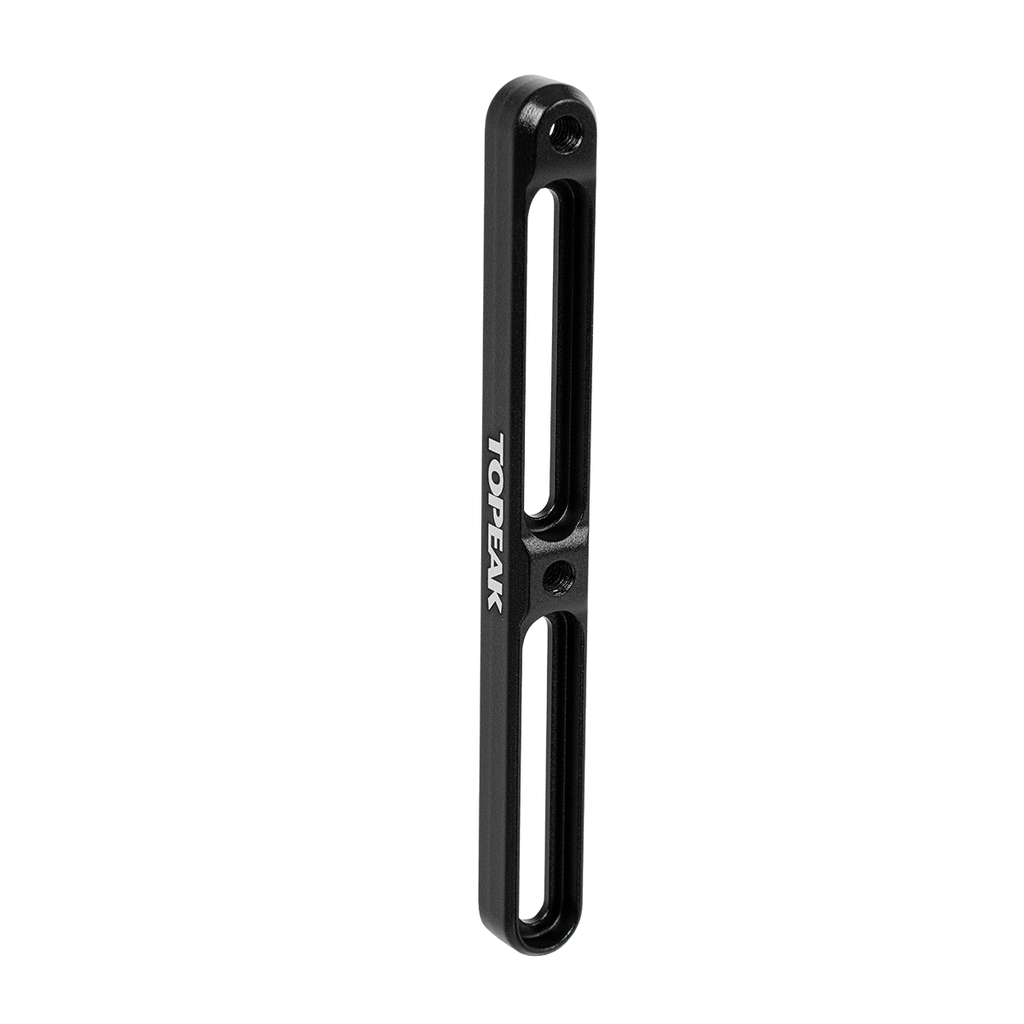 Topeak Bottle Cage Mount Extender TAPM03 mounted on a bicycle frame for secure hydration bottle storage.