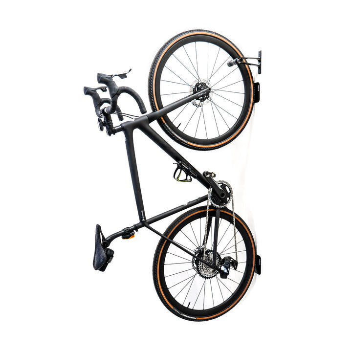 Lezyne bike display mount with CNC alloy wheel hook for secure bicycle storage and organization.