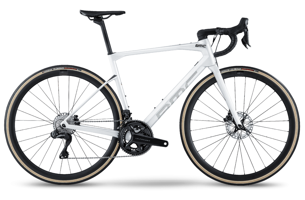 White BMC Road Bike Roadmachine ONE 2022, lightweight road bike with aerodynamic frame and sleek design.