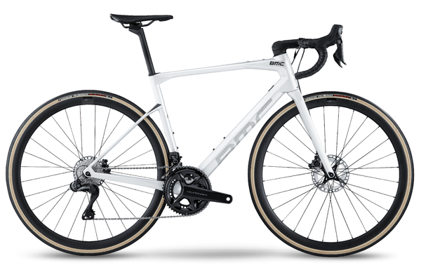 White BMC Road Bike Roadmachine ONE 2022 with lightweight frame and aerodynamic design, ideal for road cycling enthusiasts.