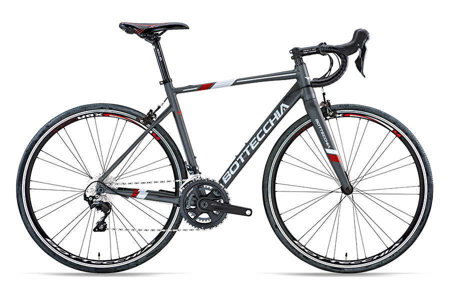 Red Bottecchia Duello Shimano 105 2022 road bike with lightweight frame and drop handlebars, ready for road cycling.