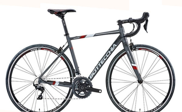 Red Bottecchia Duello road bike with Campagnolo Centaur 11-speed drivetrain, featuring lightweight frame and racing-ready design.