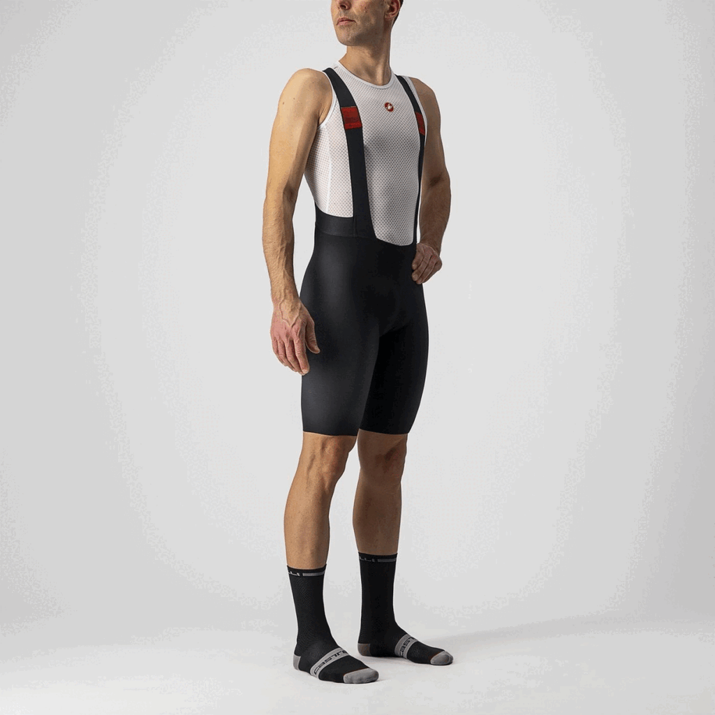 Black Castelli Premio bib shorts for cycling, featuring a snug fit and breathable fabric, designed for performance and comfort.
