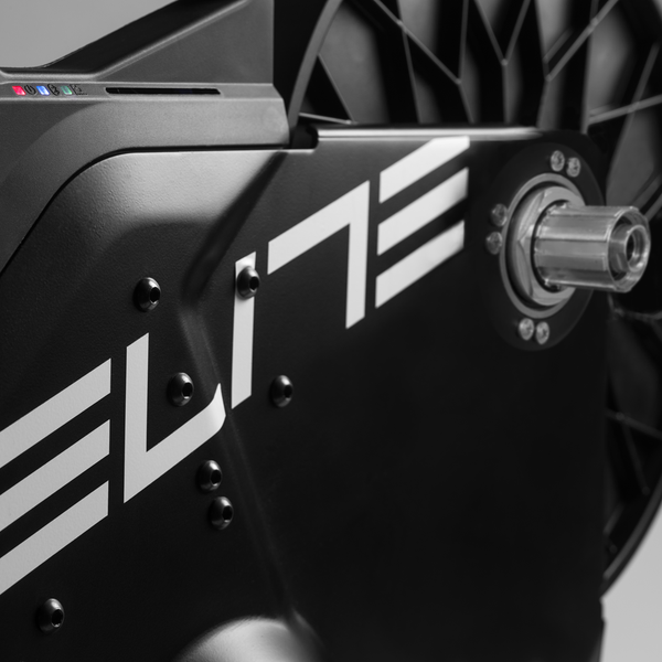 Elite Suito-T indoor smart trainer for cycling, featuring interactive resistance and adjustable components for indoor training.